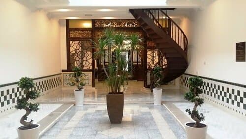 Внешний вид отеля Heeren Palm Suites