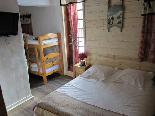 Внешний вид отеля Hotel Chalet Le Caribou в Виллар-сюр-Дороне